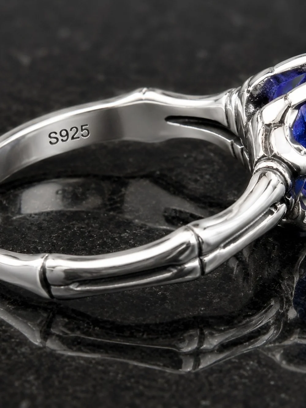 S925 Sterling Silver Ring Features A Brilliant Crackle Blue Gemstone.